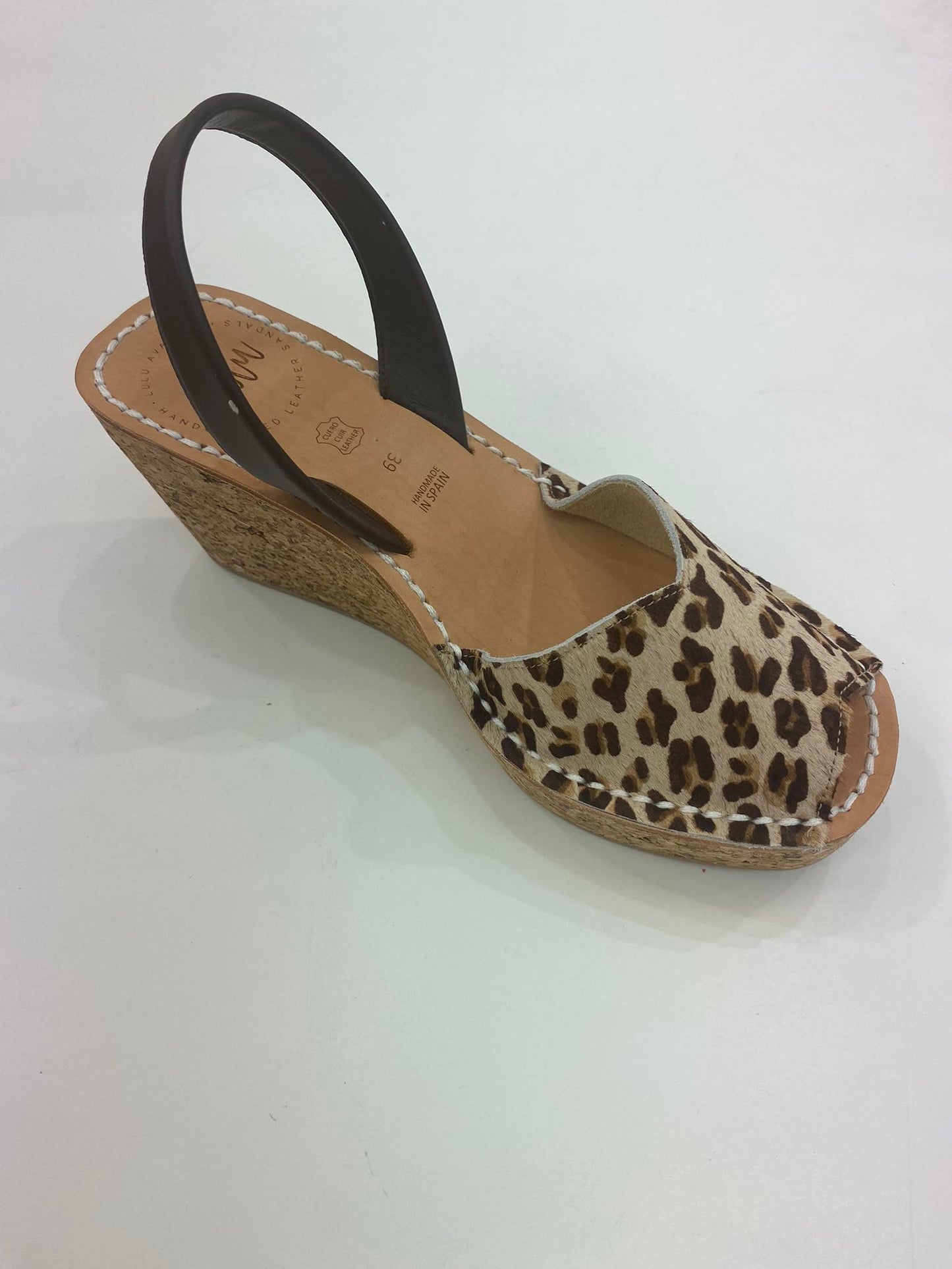 LULU AVARCAS LEATHER CORKS IN ANIMAL PRINT