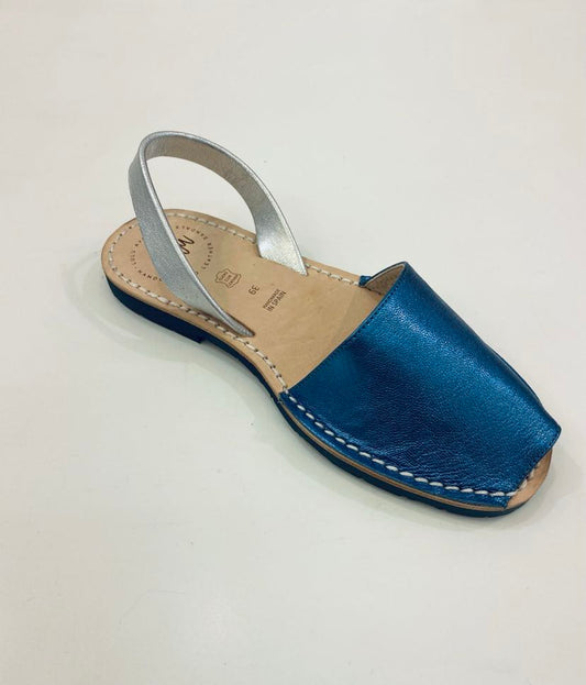 LULU AVARCAS FLAT SANDAL IN METALLIC BLUE