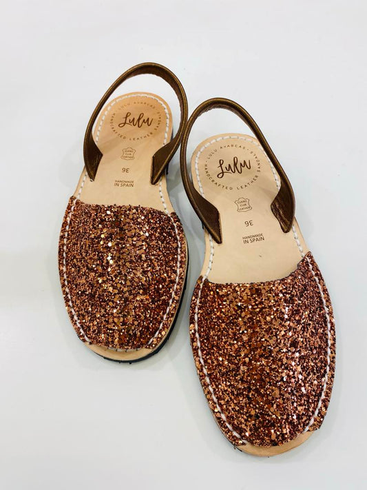 LULU AVARCAS LEATHER SANDAL IN COPPER GLITTER