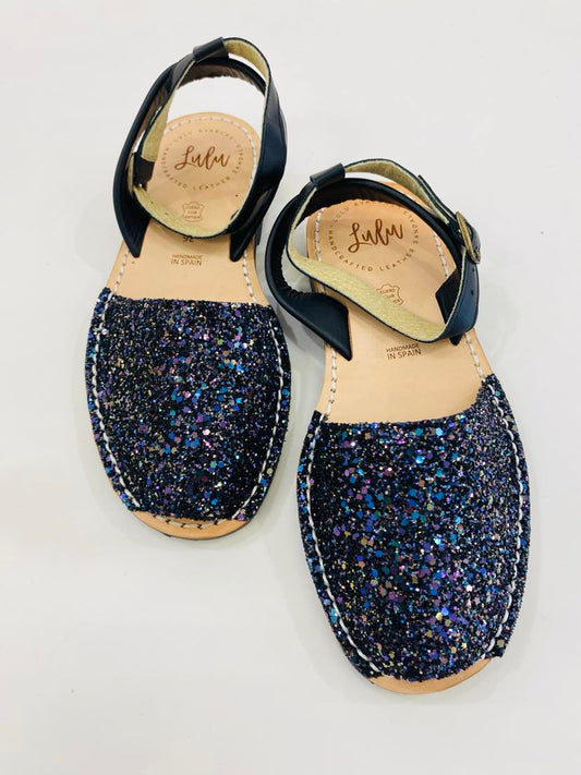 LULU AVARCAS LEATHER SANDAL IN MULTI GLITTER WITH BLACK ANKLE STRAP