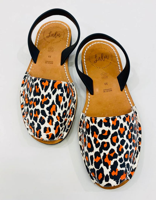 LULU AVARCAS LEATHER SANDAL IN ORANGE/BLACK ANIMAL PRINT