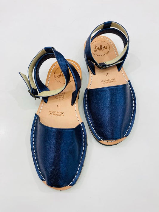LULU AVARCAS LEATHER METALLIC NAVY SANDAL WITH ANKLE STRAP