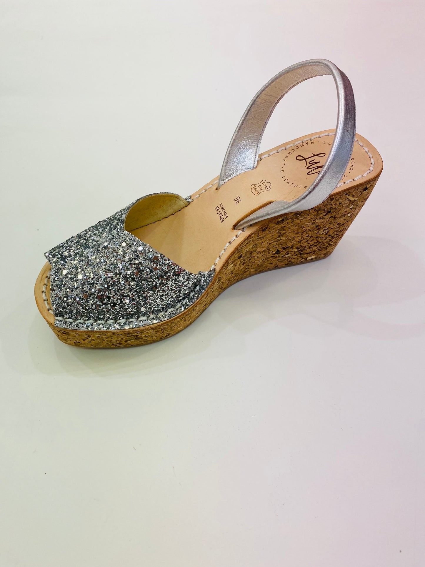 LULU AVARCAS LEATHER CORKS IN SILVER GLITTER