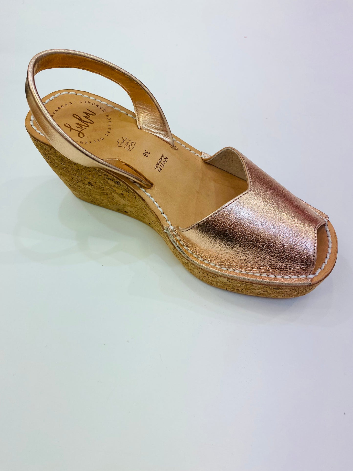 LULU AVARCAS ROSE GOLD LEATHER CORKS