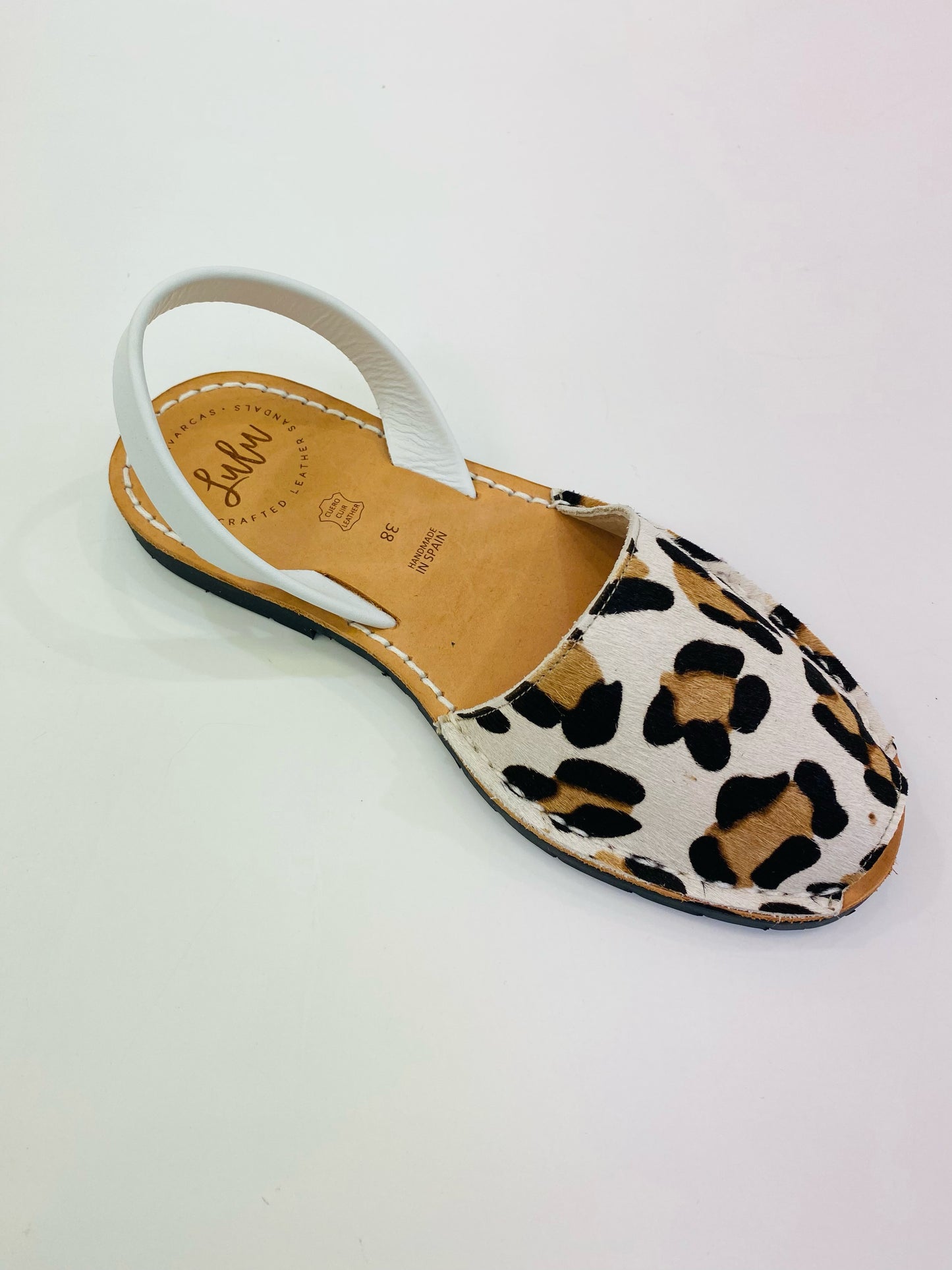 LULU AVARCAS LEATHER SANDAL IN ANIMAL PRINT WITH WHITE STRAP