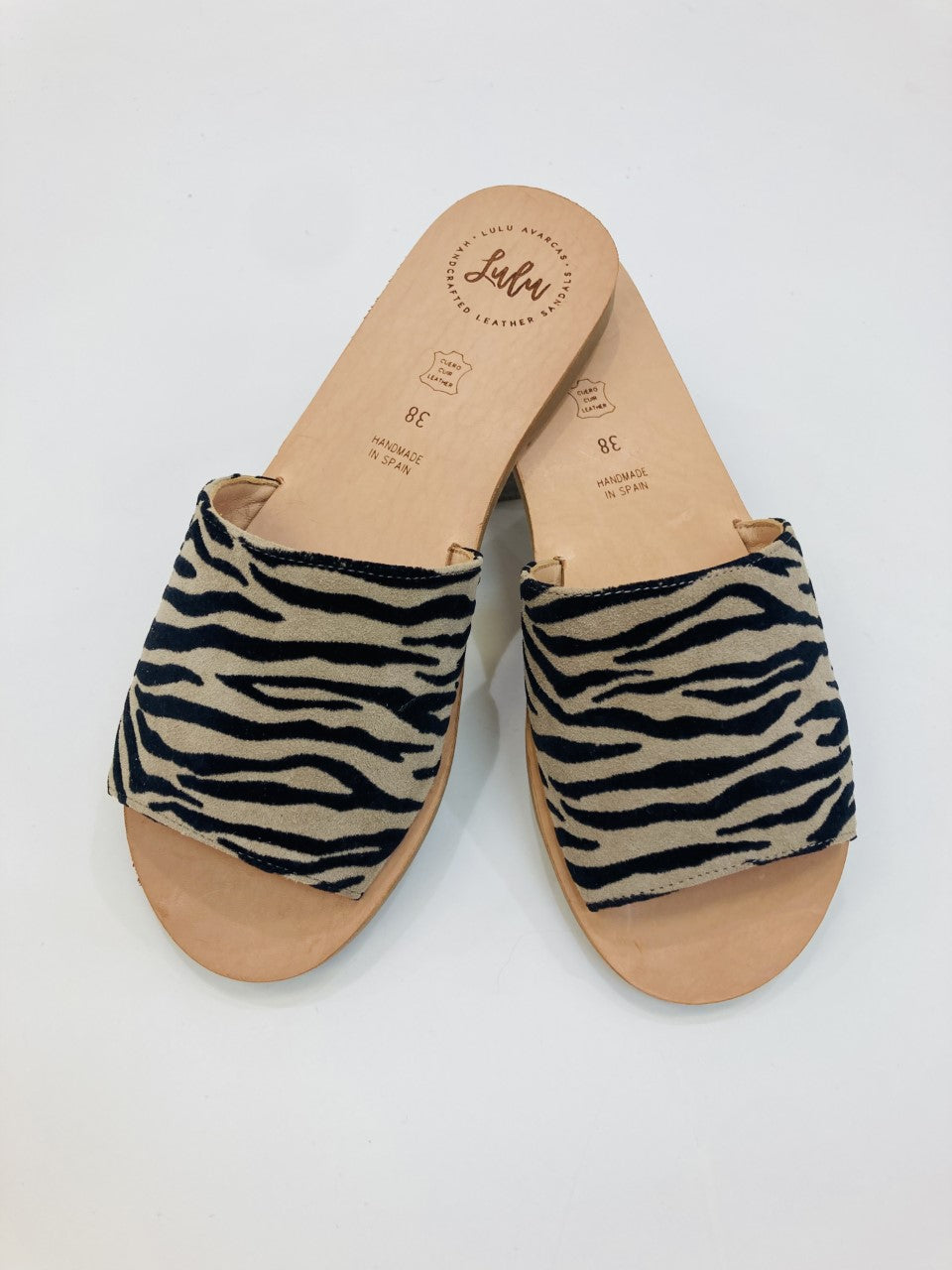 LULU AVARCAS LEATHER SLIDE IN ZEBRA PRINT