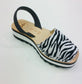 LULU AVARCAS LEATHER FLATFORM IN ZEBRA PRINT