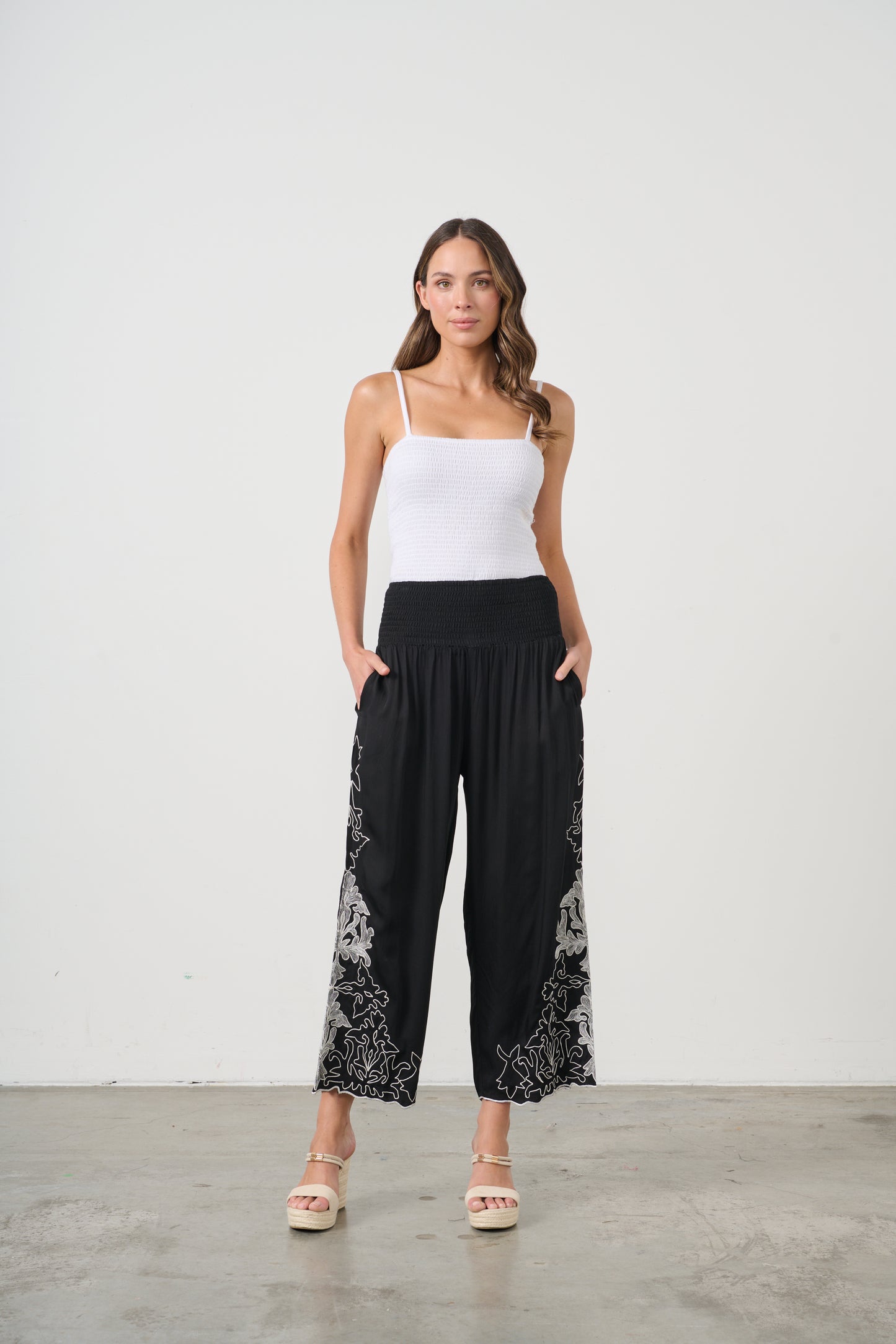 CAJU CONTRAST EMBROIDERY PANTS WITH POCKETS IN BLACK AND WHITE