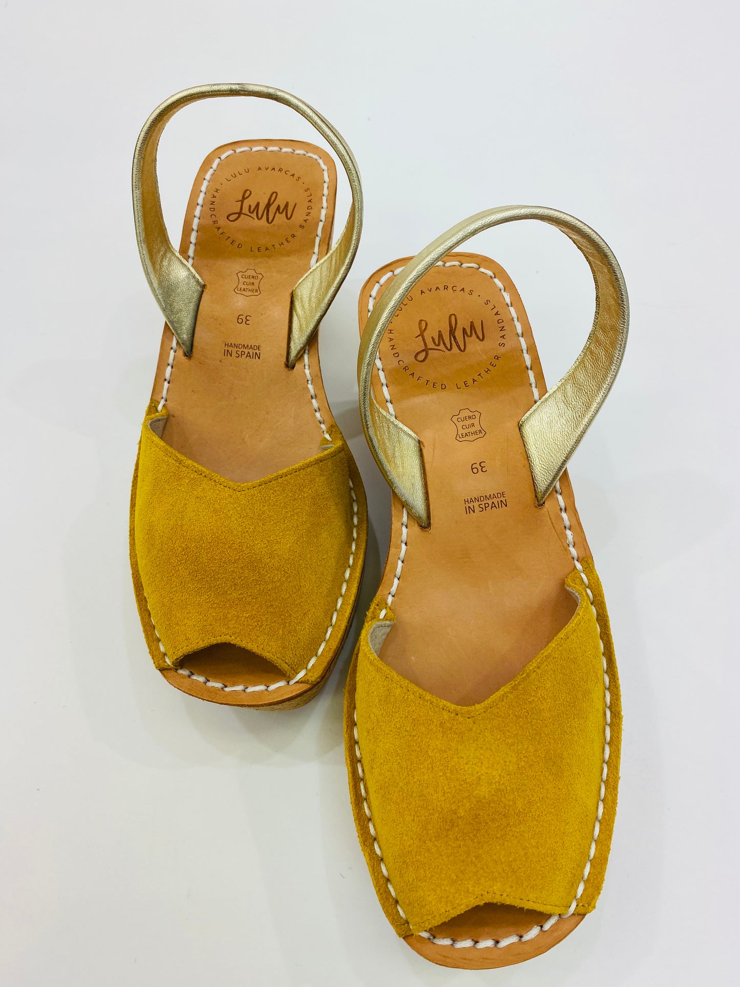 LULU AVARCAS LEATHER CORKS IN MUSTARD WITH GOLD STRAP