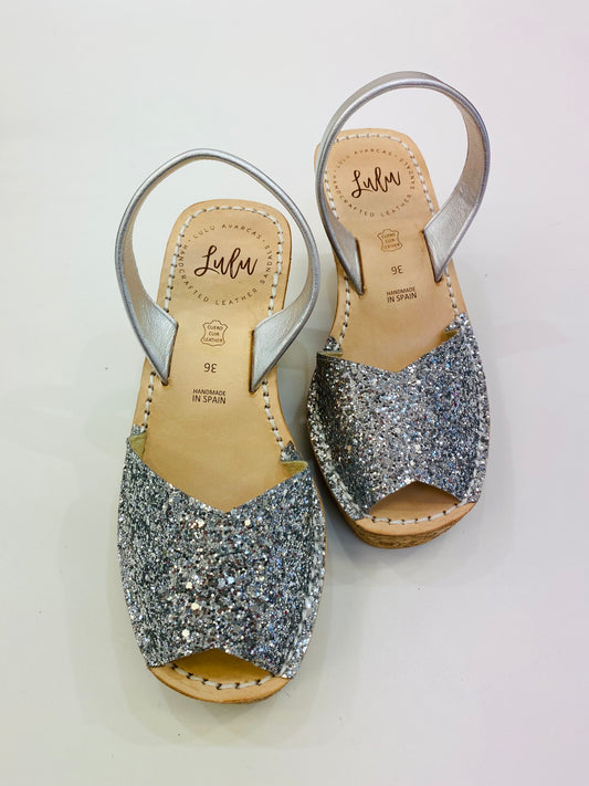 LULU AVARCAS LEATHER CORKS IN SILVER GLITTER