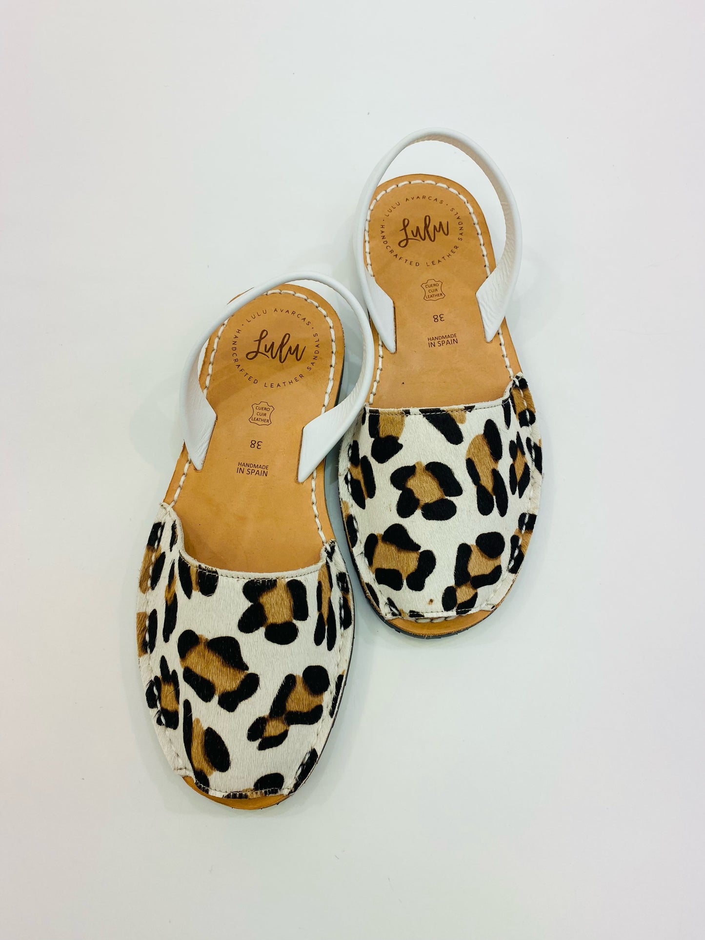 LULU AVARCAS LEATHER SANDAL IN ANIMAL PRINT WITH WHITE STRAP