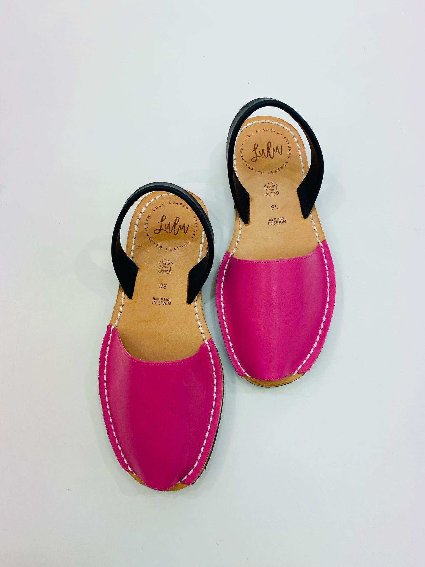LULU AVARCAS LEATHER FLAT SANDAL IN PINK WITH BLACK STRAP