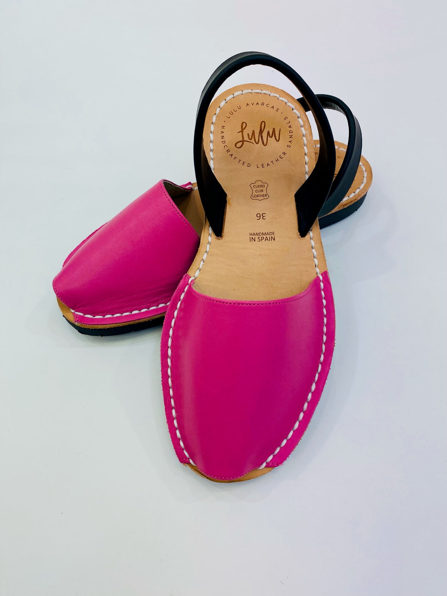 LULU AVARCAS LEATHER FLAT SANDAL IN PINK WITH BLACK STRAP
