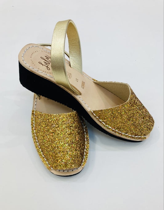 LULU AVARCAS GOLD GLITTER WEDGES